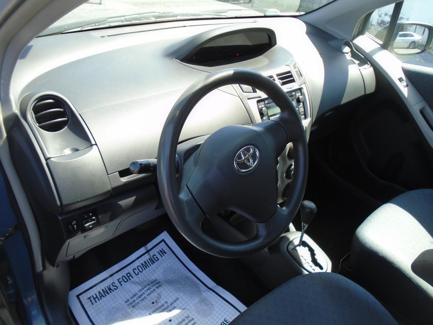 2010 BLUE /Grey Toyota Yaris Liftback 5-Door AT (JTDKT4K39A5) with an 1.5L L4 DOHC 16V engine, 4-Speed Automatic transmission, located at 6112 N Florida Avenue, Tampa, FL, 33604, (888) 521-5131, 27.954929, -82.459534 - Photo#6